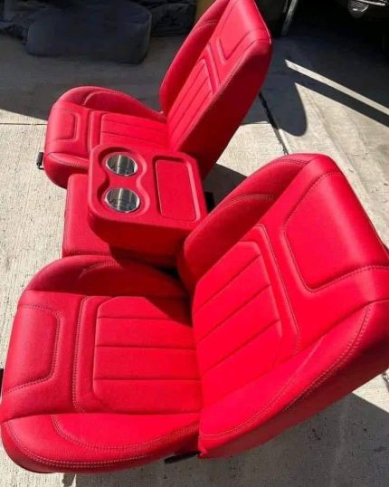 Custom C10 buddy seats, meticulously crafted from the ground up
